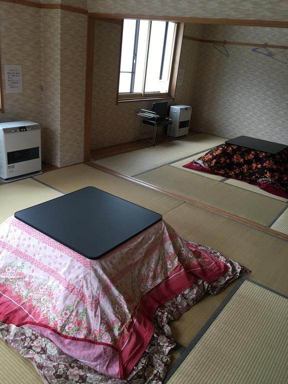Hotel Onsen Minshuku Yutakaya à Yuzawa  Extérieur photo