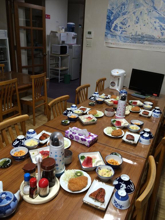 Hotel Onsen Minshuku Yutakaya à Yuzawa  Extérieur photo
