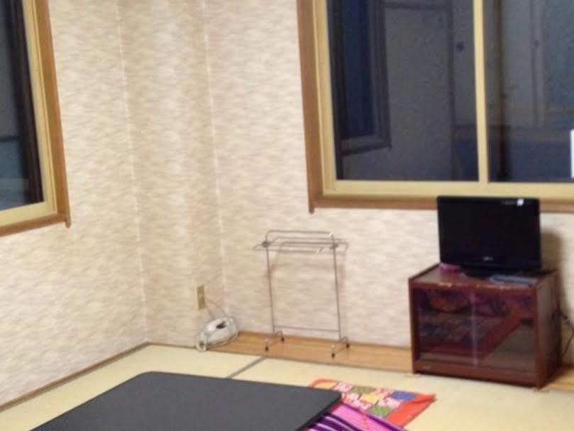 Hotel Onsen Minshuku Yutakaya à Yuzawa  Extérieur photo